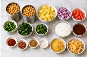 Chana Chaat ingredients including chickpeas, potatoes, onions, yogurt and spices
